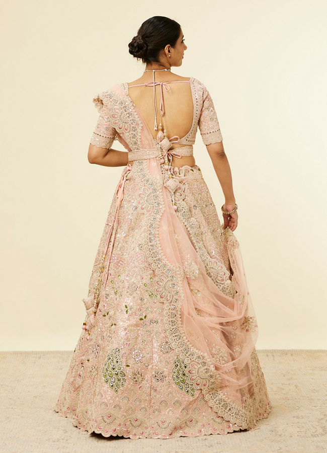 alt message - Mohey Women Golden Pink Sitara Embroidered Lehenga with Peacock Motifs image number 4